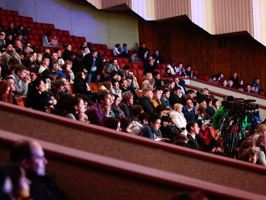 Attendees seated at an industry event